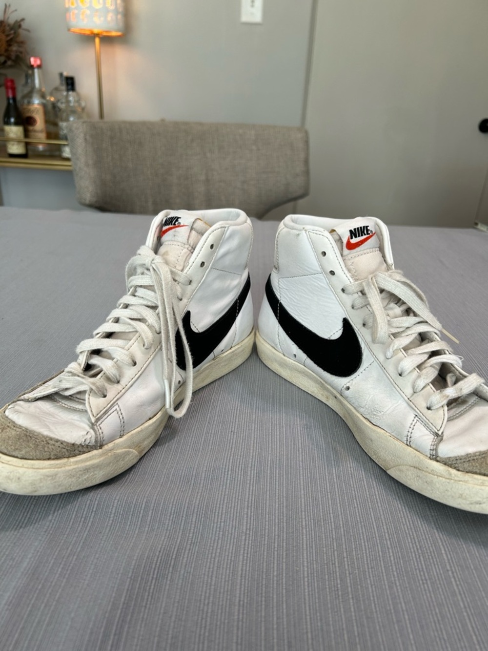 Nike White and Black High-Top Sneakers with Orange Logo